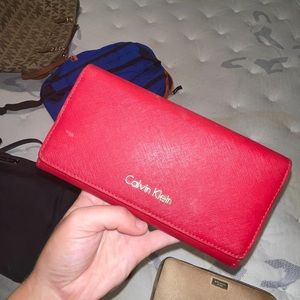 Red Calvin Klein wallet, very clean & perfect condition